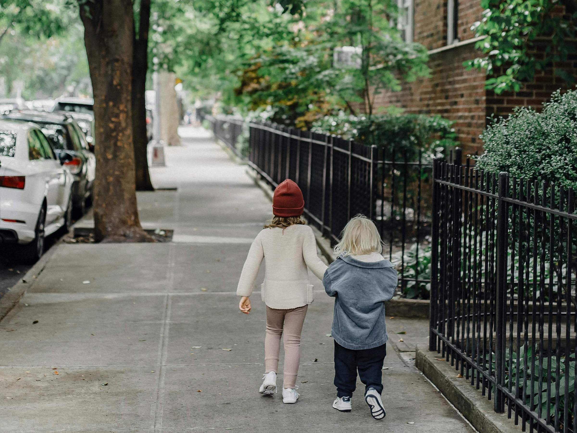 children walking down a street