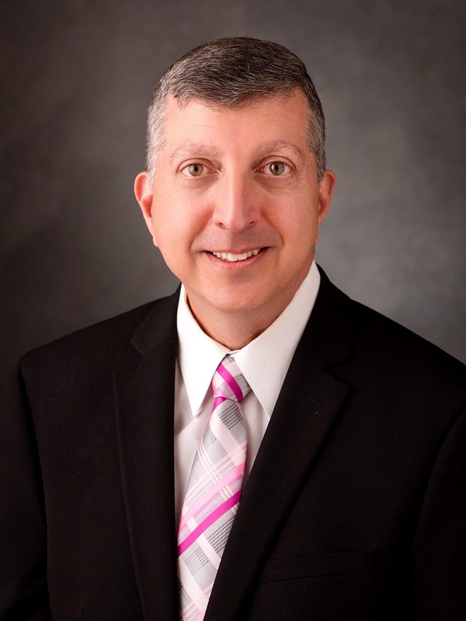 Angelo Giardino Headshot pink tie