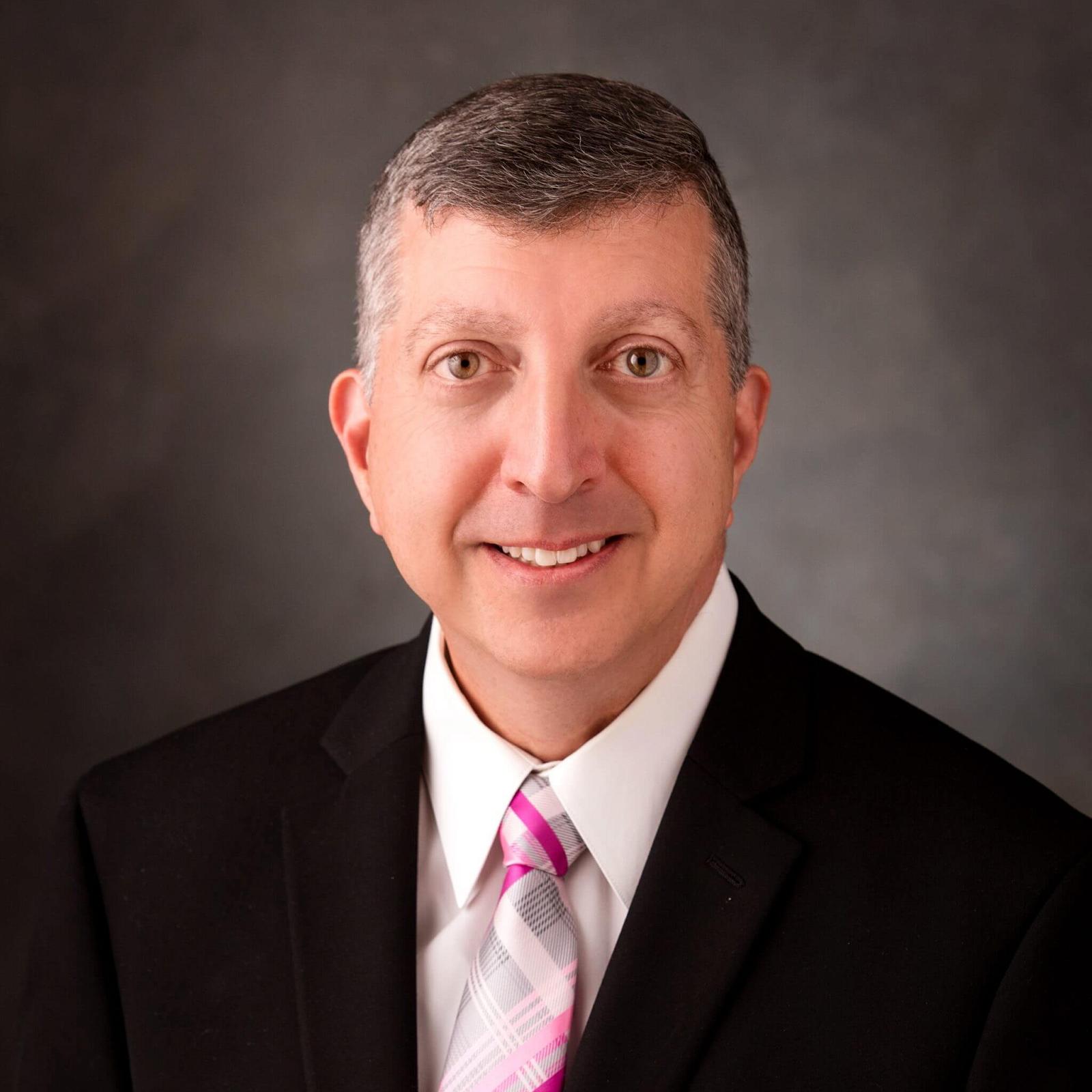 Angelo Giardino Headshot pink tie